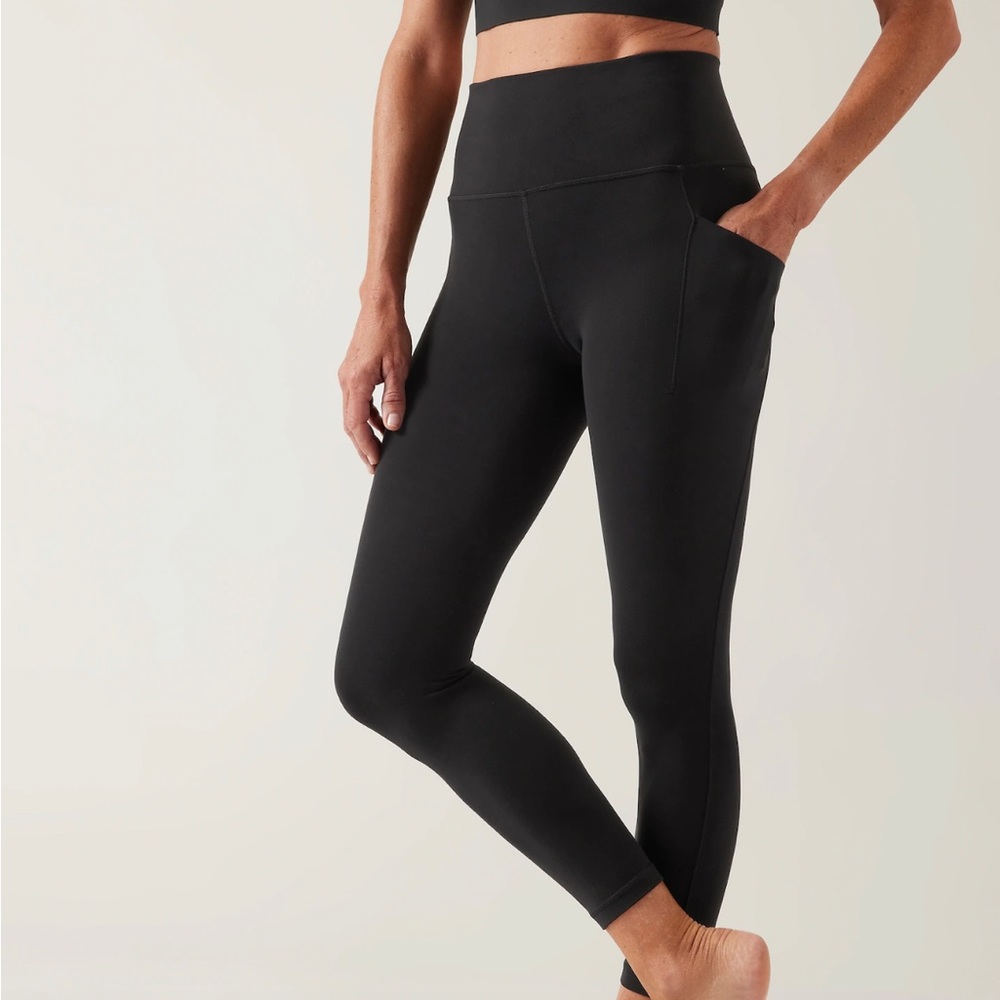 Athleta Stash Pocket Salutation Leggings